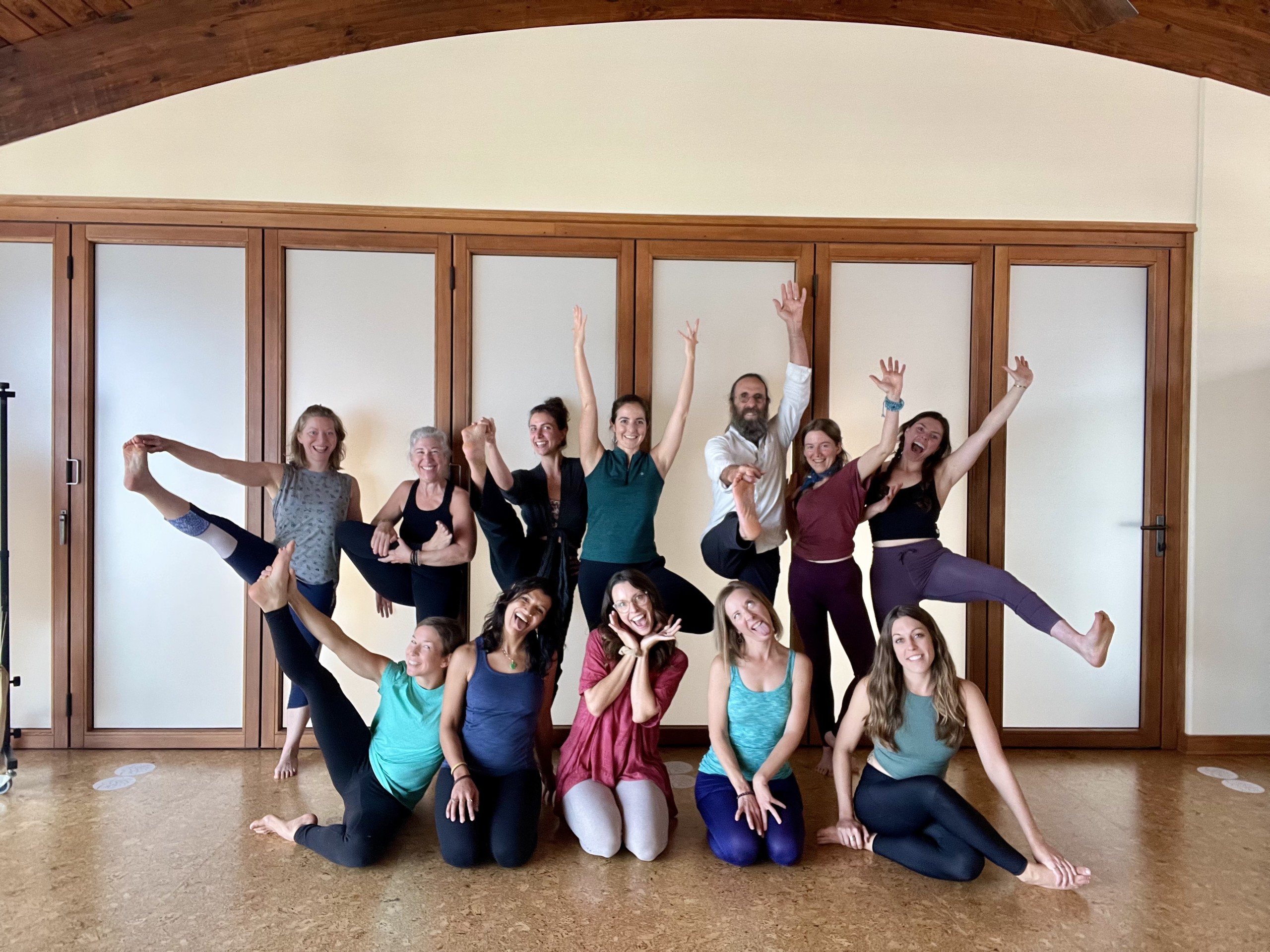 Studio teachers pose while making silly faces.